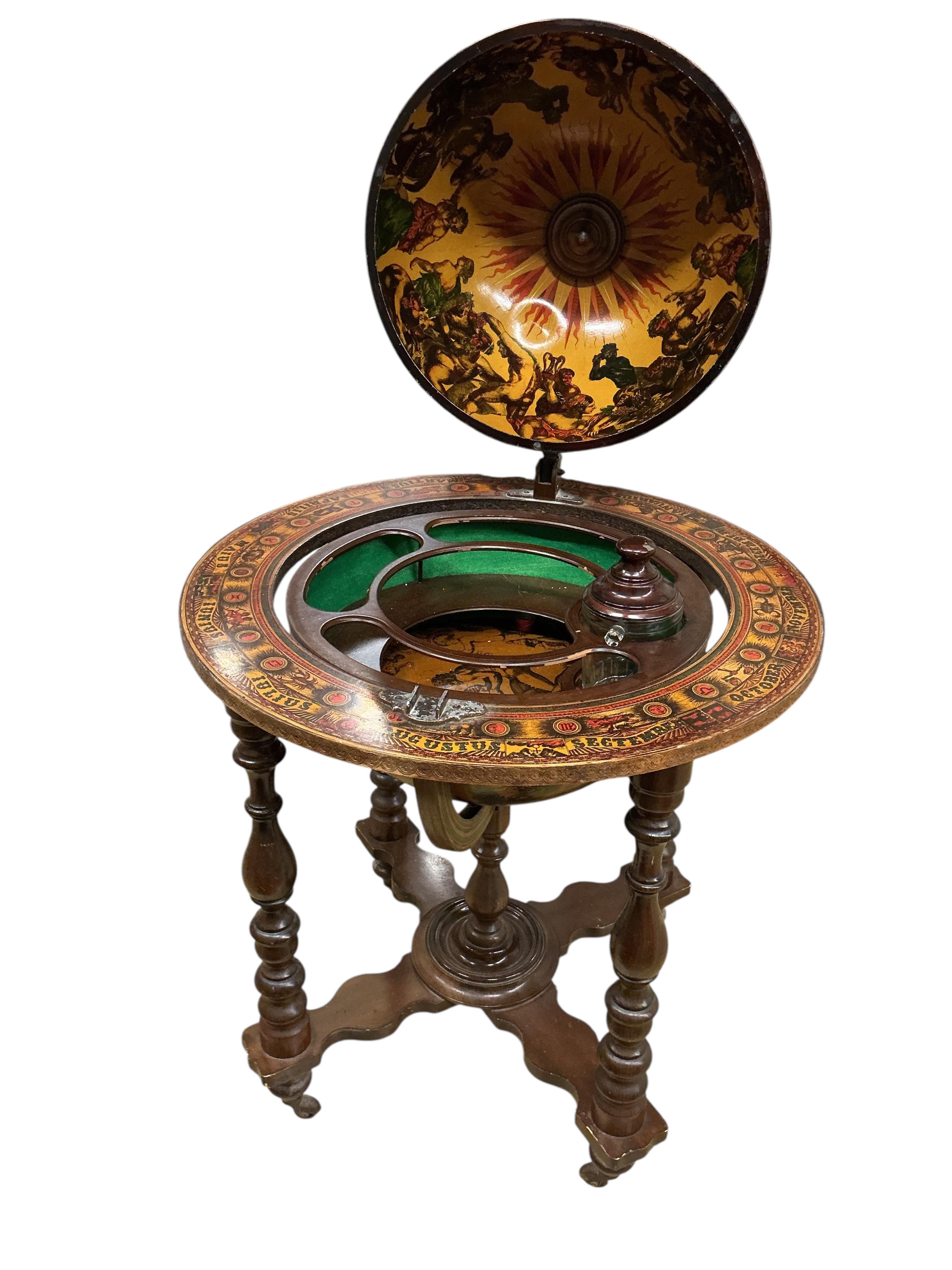 A reproduction globe drink's trolley, height 102cm